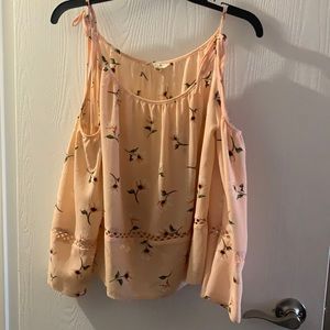 Peach colored open shoulder blouse